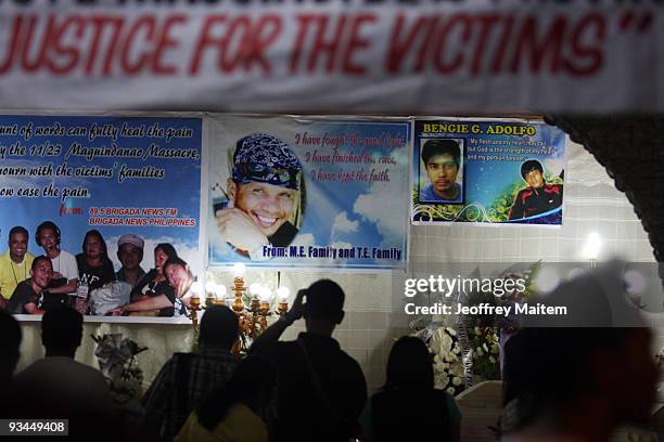 Relatives, friends and supporters of journalists among 57 people massacred in the southern Philippine town of Ampatuan in Maguindanao attend a wake...