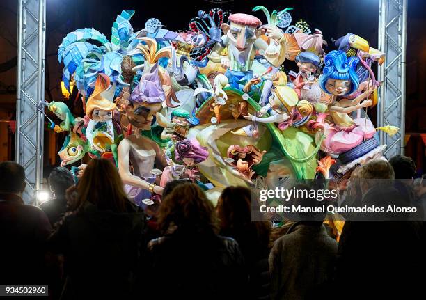 People walk past a Falla Gonzalbo-Conde Altea during the Fallas Festival on March 16, 2018 in Valencia, Spain. The Fallas festival, which runs from...