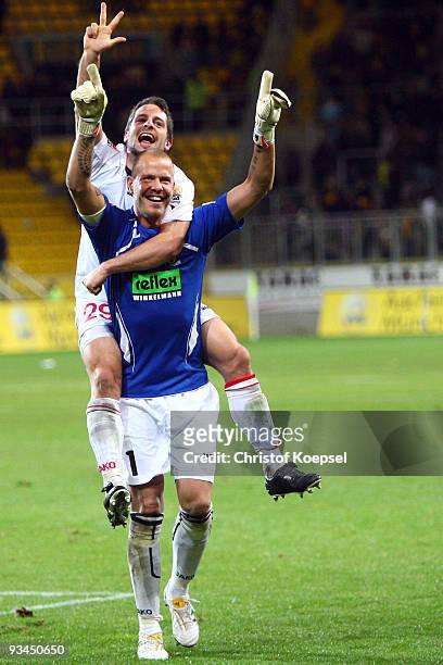 Nils Doering and Sascha Kirschstein of Ahlen celebrate the 2-0 victory after the second Bundesliga match between Alemannia Aachen and Rot Weiss Ahlen...