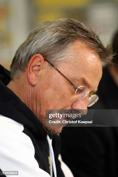 Head coach Michael Krueger of Aachen looks thoughtful during the press conference after losing 0-2 the second Bundesliga match between Alemannia...