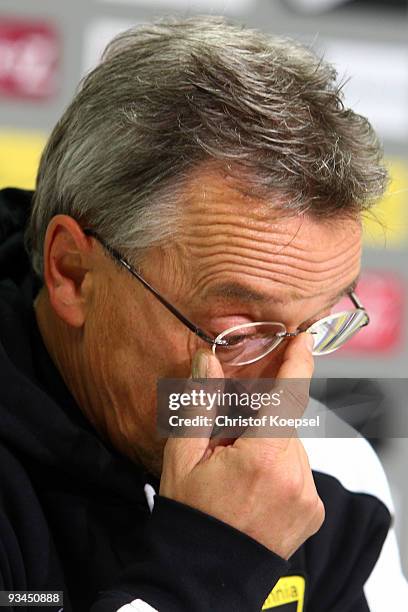 Head coach Michael Krueger of Aachen looks thoughtful during the press conference after losing 0-2 the second Bundesliga match between Alemannia...