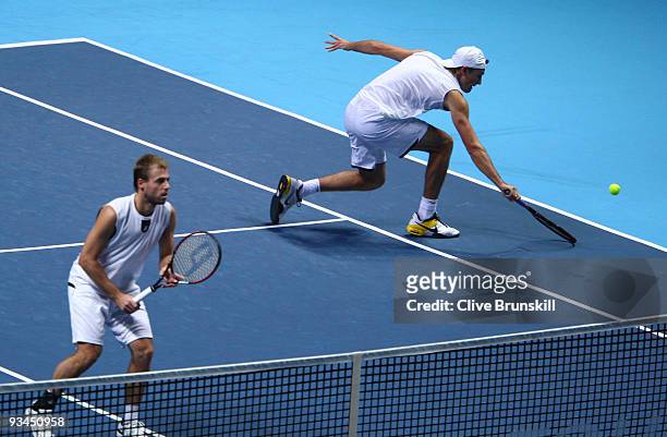 Lukasz Kubot of Poland plays with Oliver Marach of Austria during the men's doubles round robin match against Bob Bryan of USA and Mike Bryan of USA...