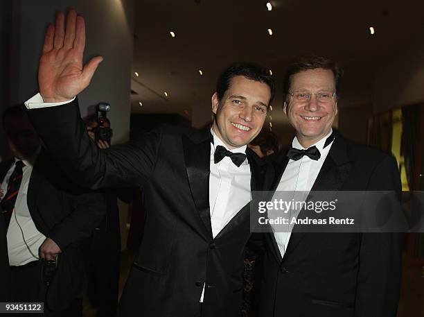 German Foreign Minister Guido Westerwelle and Michael Mronz attend the annual press ball 'Bundespresseball' at the Intercontinental Hotel in Berlin...