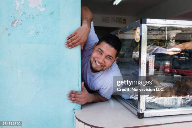 caribbean life in puerto rico - luquillo stock-fotos und bilder