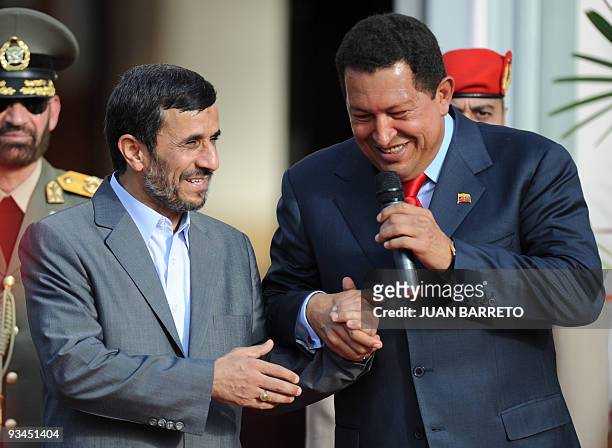 Iranian President, Mahmoud Ahmadinejad and Venezuelan President Hugo Chavez deliver a joint conference at Miraflores presidential palace in Caracas...
