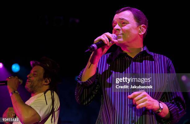 Singer and percussionist Terence 'Astro' Wilson and singer Duncan Campbell of the British reggae band UB40 perform live during a concert at the...