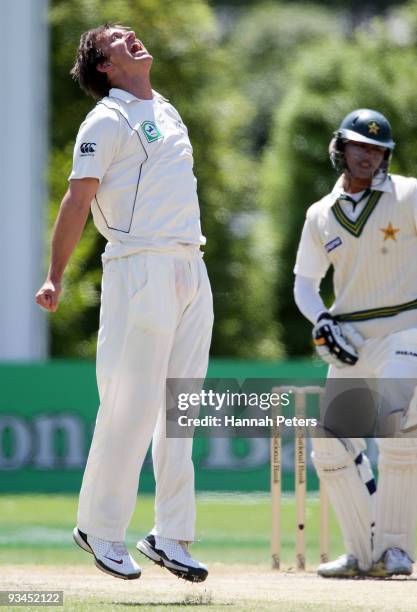 Shane Bond of New Zealand celebrates the wicket of Khurram Manzoor of Pakistan during day five of the First Test match between New Zealand and...