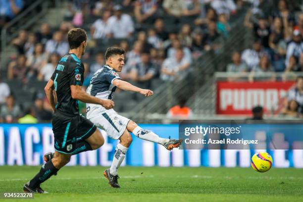 Arturo Gonzalez of Monterrey kicks the ball and scores his team's third goal during the 12th round match between Monterrey and Queretaro as part of...