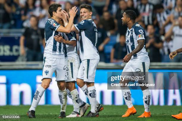 Arturo Gonzalez of Monterrey celebrates with teammates after scoring his team"u2019s third goal during the 12th round match between Monterrey and...