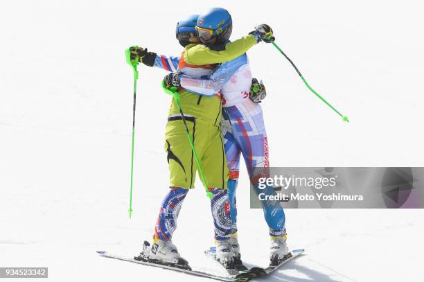 Jakub Krako of Slovakia and his guide Branislav Brozman celebrate after competing in the Alpine Skiing Men's Slalom - Visually Impaired on day eight...