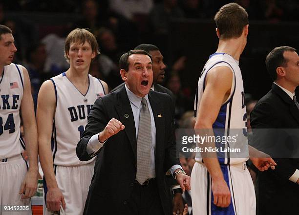 Head coach of the Duke Blue Devils, Mike Krzyzewski yells from the bench against the Connecticut Huskies during the Championship game at Madison...