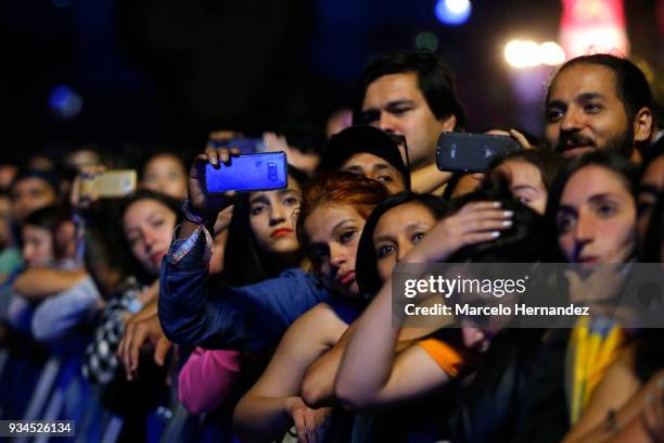Fans enjoy the atmosphere during the show of Red Hot Chili Peppers as part of the second day of Lollapalooza Chile 2018 at Parque O'Higgins on March...