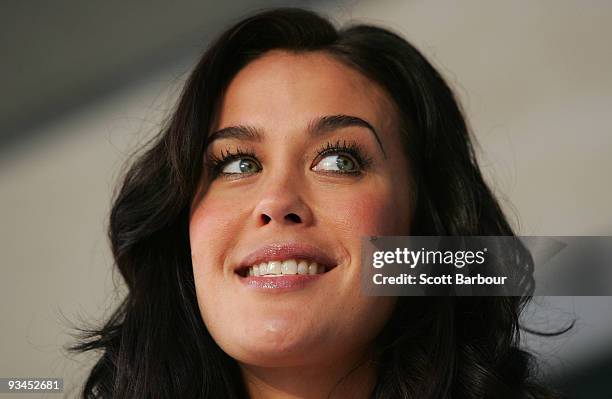 Model Megan Gale smiles as she attends the official opening of stage one of the David Jones Bourke Street Mall redevelopment on November 28, 2009 in...