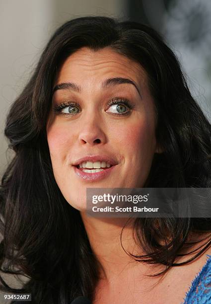 Model Megan Gale talks as she attends the official opening of stage one of the David Jones Bourke Street Mall redevelopment on November 28, 2009 in...