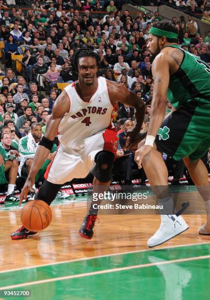 Chris Bosh of the Toronto Raptors drives to the basket against Rasheed Wallace of the Boston Celtics on November 27, 2009 at the TD Garden in Boston,...