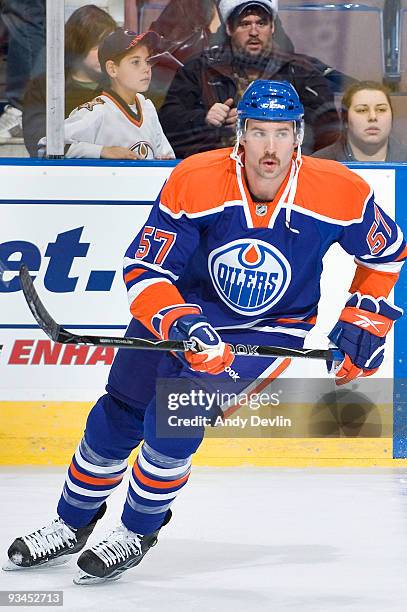 Colin McDonald of the Edmonton Oilers warms up before his first ever NHL game against the San Jose Sharks at Rexall Place November 27, 2009 in...