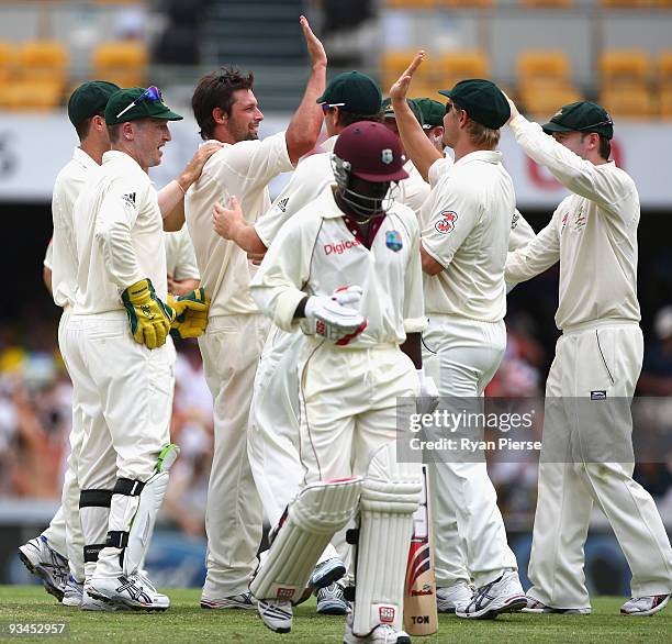 Ben Hilfenhaus of Australia celebrates after claiming the wicket of Travis Dowlin of the West Indies during day three of the First Test match between...