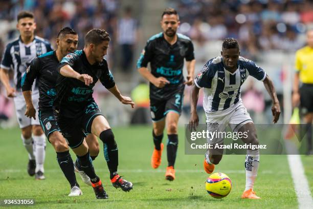 Aviles Hurtado of Monterrey fights for the ball with Hiram Mier of Queretaro during the 12th round match between Monterrey and Queretaro as part of...