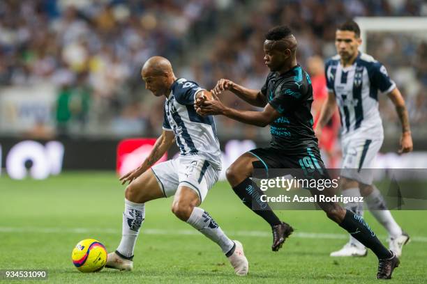 Carlos Sanchez of Monterrey fights for the ball with Yerson Candelo of Queretaro during the 12th round match between Monterrey and Queretaro as part...