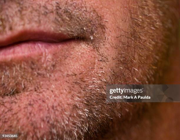 half smile - extreme close up mouth stock pictures, royalty-free photos & images