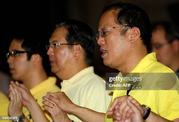 Liberal Party standard bearer Senator Benigno 'Noynoy Aquino , son of the late democracy icon Corazon Aquino, attends a morning mass before he filed...