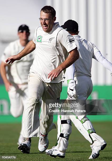 Daniel Vettori of New Zealand celebrates the wicket of Mohammad Aamer of Pakistan to win the First Test match on day five between New Zealand and...