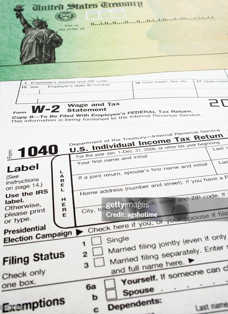 Tax Check Back Income Tax Refund Check And Forms High-Res Stock Photo - Getty Images