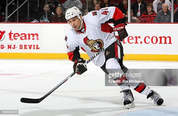 Jonathan Cheechoo of the Ottawa Senators skates against the New Jersey Devils at the Prudential Center on November 25, 2009 in Newark, New Jersey....