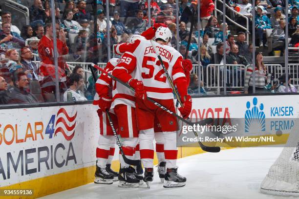 Gustav Nyquist of the Detroit Red Wings celebrates with teammates after scoring a goal against the San Jose Sharks at SAP Center on March 12, 2018 in...