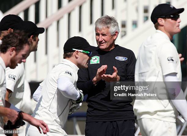 New Zealand team manager Dave Currie claps the team off for the tea break during day five of the First Test match between New Zealand and Pakistan at...