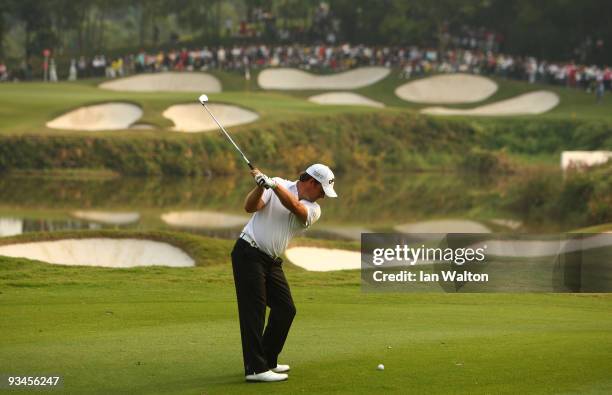Graeme McDowell of Ireland in action during the Fourballs on the 3rd day of the Omega Mission Hills World Cup on the Olazabal course on November 28,...