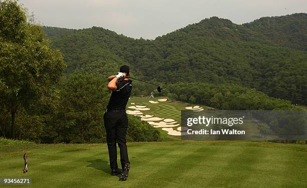 Ross Fisher of England in action during the Fourballs on the 3rd day of the Omega Mission Hills World Cup on the Olazabal course on November 28, 2009...