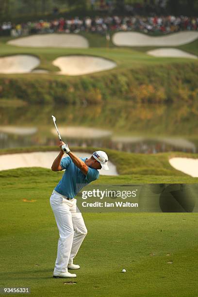 Henrik Stenson of Sweden in action during the Fourballs on the 3rd day of the Omega Mission Hills World Cup on the Olazabal course on November 28,...