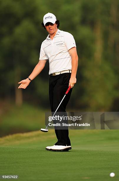 Rory McIlroy of Ireland reacts to his putt on the 15th hole during Fourball on the third day of the Omega Mission Hills World Cup on the Olazabal...