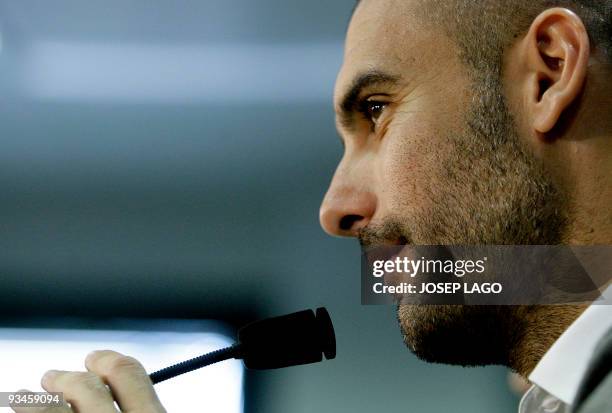 Barcelona's coach Pep Guardiola gestures during a press conference after a training session at Ciutat Esportiva Joan Gamper near Barcelona on...