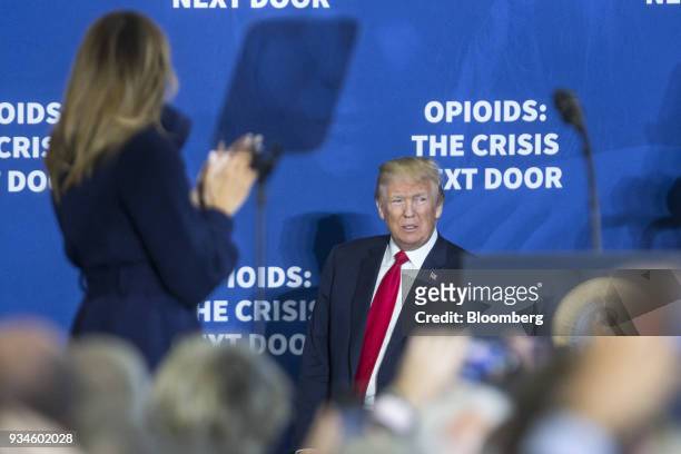 First Lady Melania Trump, left, introduces U.S. President Donald Trump during an event at Manchester Community College in Manchester, New Hampshire,...
