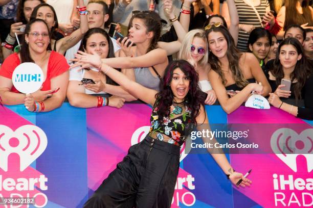Alessia Cara walks the red carpet at the 2017 iHeartRadio Much Music Video Awards in Toronto.