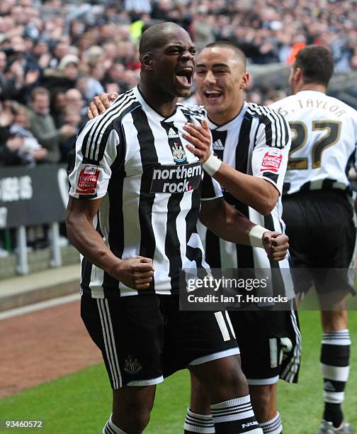 Marlon Harewood of Newcastle United celebrates with Danny Simpson after scoring the opening goal during the Coca-Cola Championship game between...