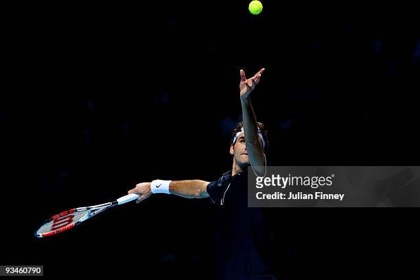 Roger Federer of Switzerland serves the ball during the men's singles semi final match against Nikolay Davydenko of Russia during the Barclays ATP...