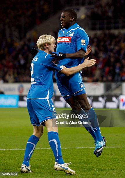 Demba Ba of Hoffenheim celebrates scoring his team's first goal with team mate Andreas Beck of Hoffenheim during the Bundesliga match between 1899...