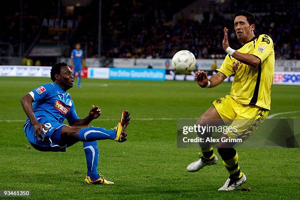 Lucas Barrios of Dortmund tries to block a shot of Chinedu Obasi of Hoffenheim during the Bundesliga match between 1899 Hoffenheim and Borussia...