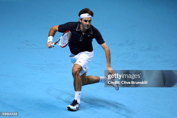 Roger Federer of Switzerland returns the ball during the men's singles semi final match against Nikolay Davydenko of Russia during the Barclays ATP...