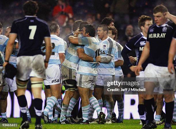 Argentina players celebrate victory at the end of the Bank Of Scotland Corporate Autumn Test match against Scotland at Murrayfield on November 28,...