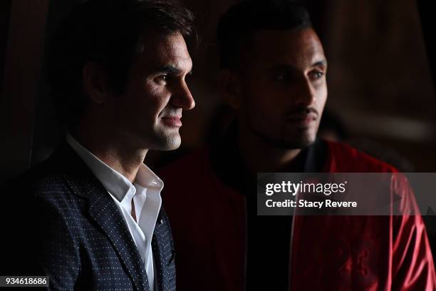 Roger Federer of Switzerland of Switzerland and Nick Kyrgios of Australia of Australia look on during a press conference at the Chicago Athletic...