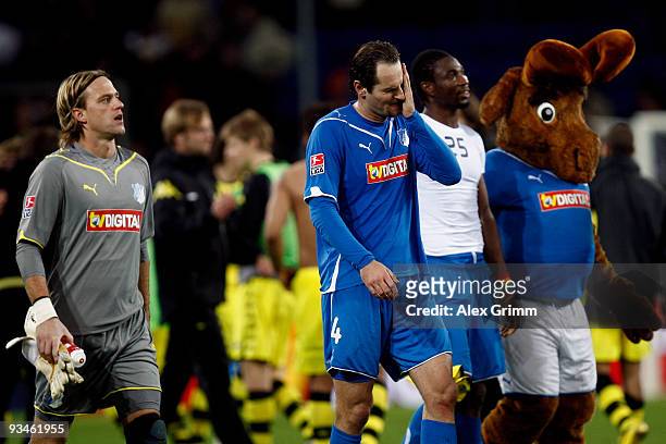 Goalkeeper Timo Hildebrand, Josip Simunic, Isaac Vorsah and mascot 'Hoffi' of Hoffenheim look dejected after the Bundesliga match between 1899...