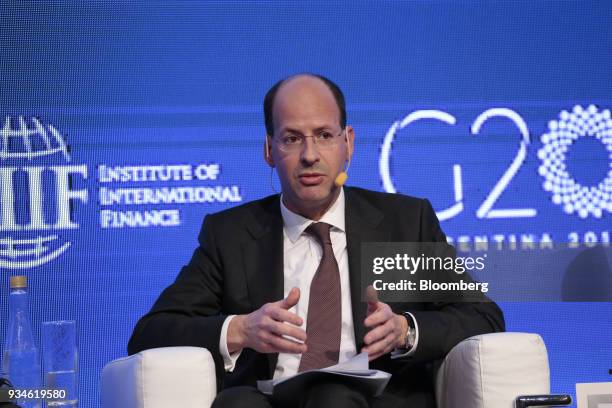 Jerome Haegeli, chief economist of Swiss Reinsurance Co., speaks during the Institute of International Finance G20 Conference in Buenos Aires,...