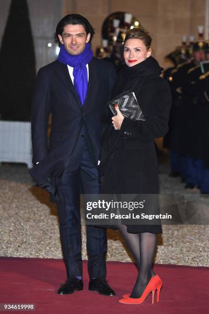 French cellist Gautier Capucon and Delphine Capucon, attend a State dinner hosted by French President Emmanuel Macron and Brigitte Macron at the...