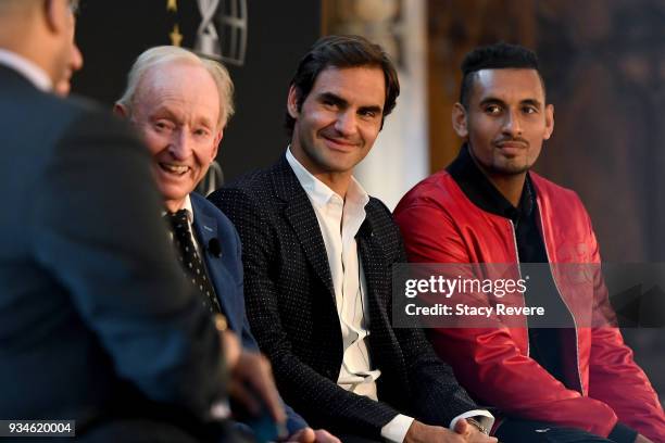 Rod Laver , Roger Federer of Switzerland and Nick Kyrgios of Australia look on during a press conference at the Chicago Athletic Association during...