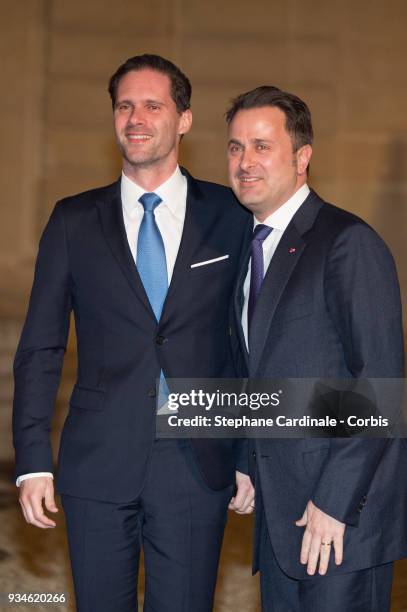 Luxembourg's Prime Minister Xavier Bettel and his husband Gauthier Destenay attend a State dinner at the Elysee Palace on March 19, 2018 in Paris,...