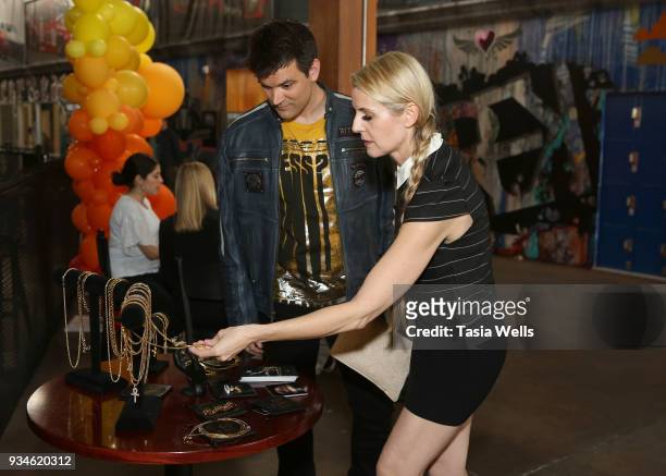 Kash Hovey and Kathy Kolla attend The Brand Bash's Adrenaline Bash at Racer's Edge on March 18, 2018 in Burbank, California.
